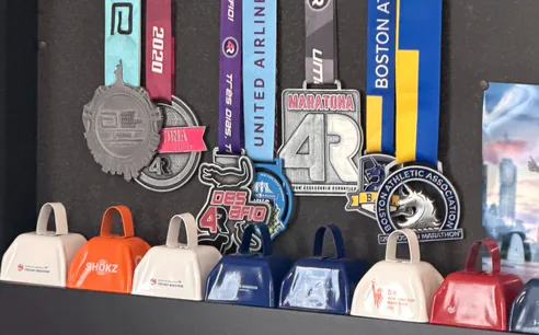 Medalhas de provas de corrida conquistadas por alunos da 4Run